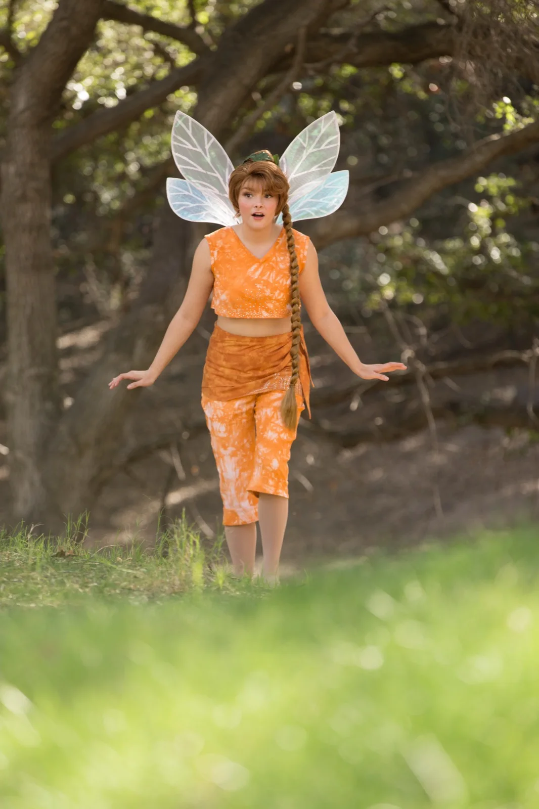 Orange Fairy party character in Boise